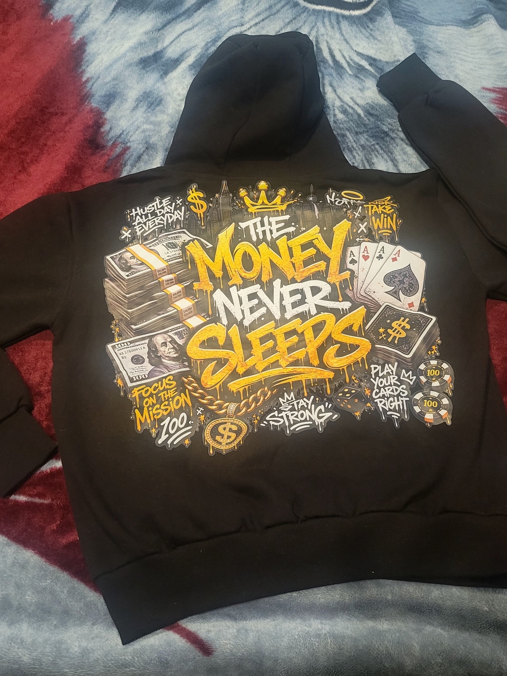Black Crewneck Hoodie with Gold & White 'The Money Never Sleeps' Graphic